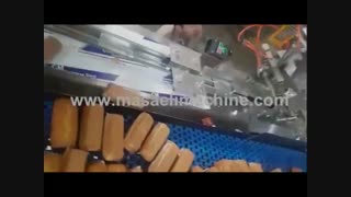 دستگاه بسته بندی کیک خانگی